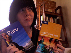 Woman with travel books