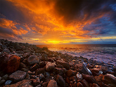 Sunset over a rocky coastline